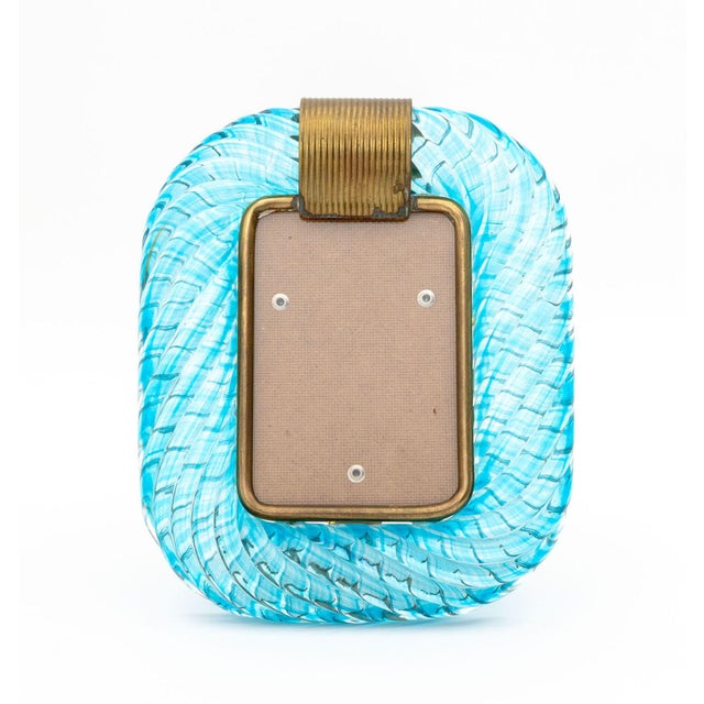 Barovier and Toso Murano Aquamarine Blue Glass and Brass Picture Frame, unmarked. 9" H x 7.25" W x 4.75" D. Provenance:...