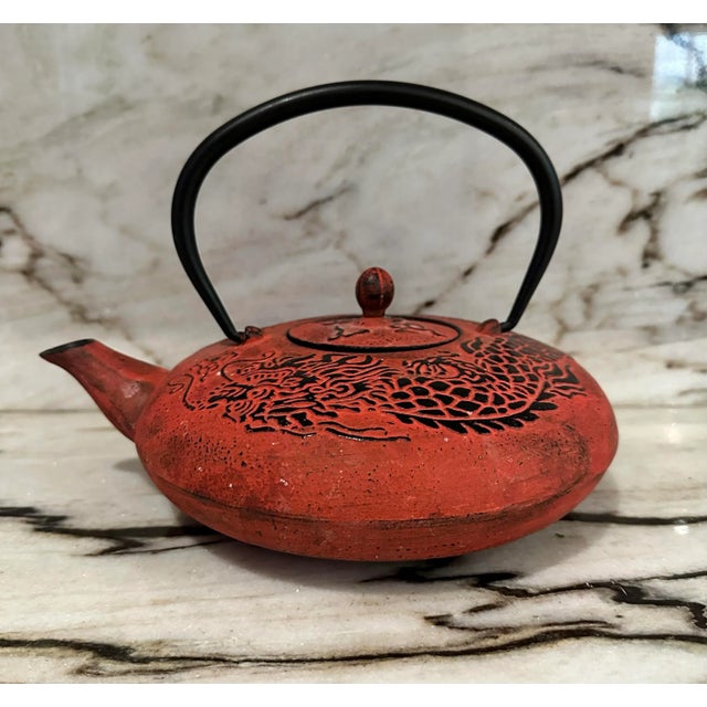 Vintage Japanese large cast iron with dragon motif teapot.