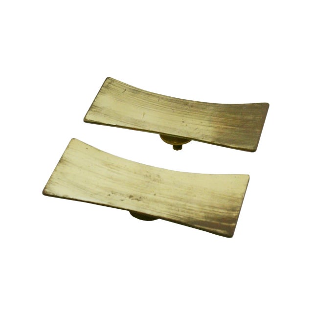 Mid-Century Modern iconic door handle made of solid brass. Italy 40s Measurements per handle: W 3 x D 9 x H 21 cm.