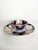 Japanese porcelain plate and bowl set dating from the 19th century. This decorative two-piece ensemble features...