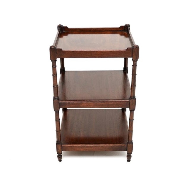 A smart and very useful antique Georgian style three tier side table. This was made in England, we would date it to around...