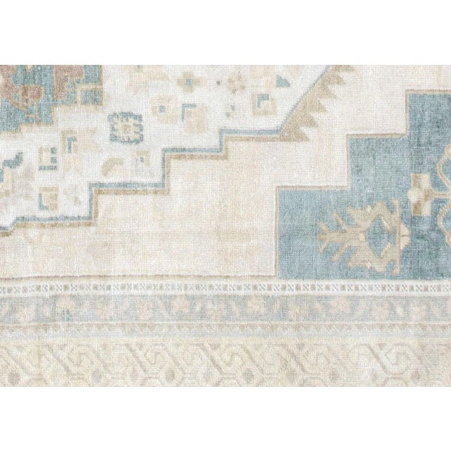 1960s Turkish Oushak Carpet. Handwoven with wool on wool foundation in the Oushak region of Western Turkey. The Anatolian...