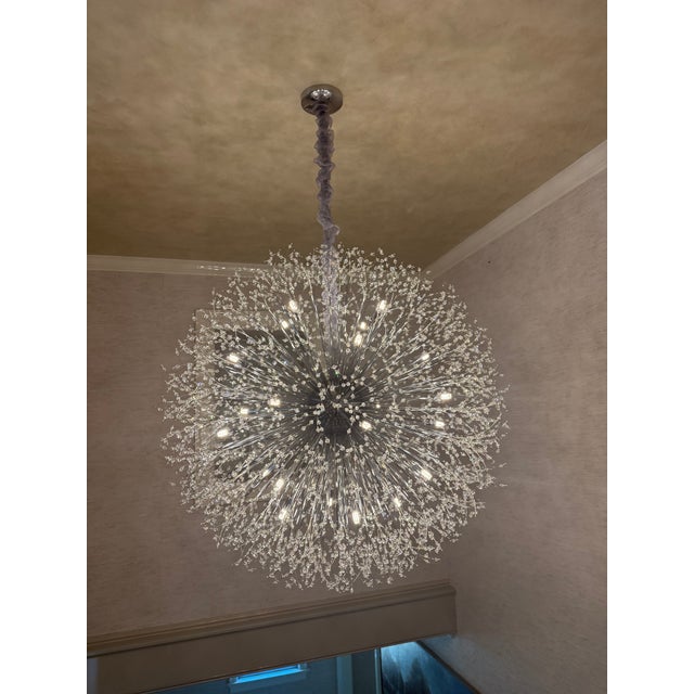 Modern sputnik sphere chandelier. Unique, brand new and beautiful chandelier composed of multiple crystals and features...