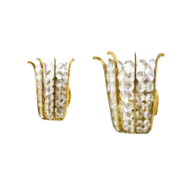 A pair of Kinkeldey, Germany, brass and crystal sconces. Dimensions : 8.5 x 9.5 x 3. All measurements are in inches....