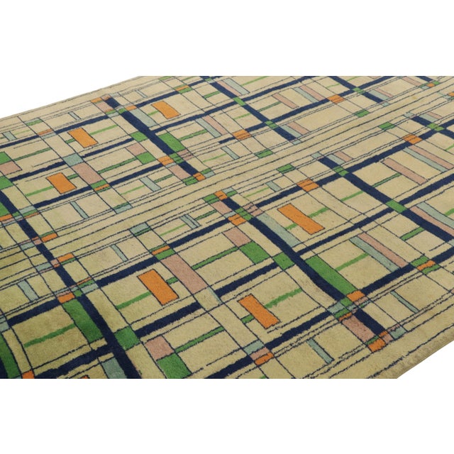 Hand-knotted in wool and originating from Turkey circa 1960 – 1970, this 7x10 vintage Zeki Müren rug is a unique addition...