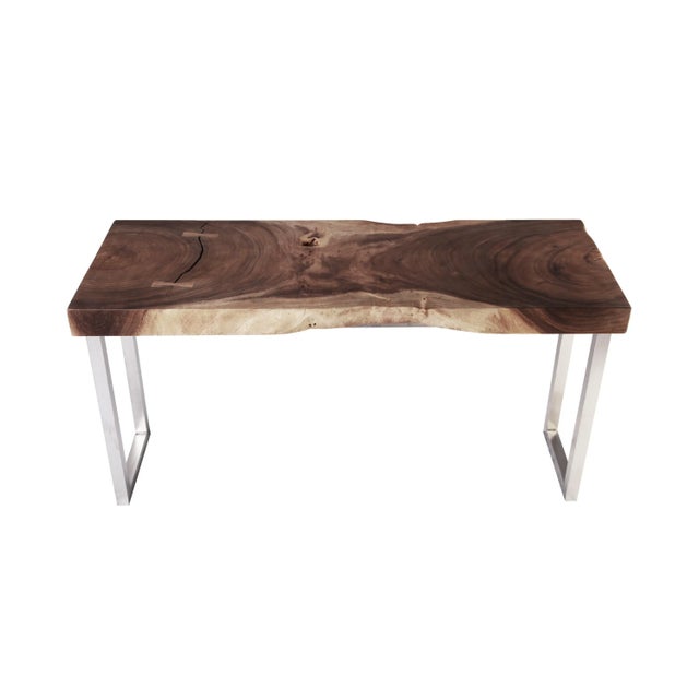 This modern console table has a 3.5" thick top with the rippling rain drops wood grains and slightly living edged and is...