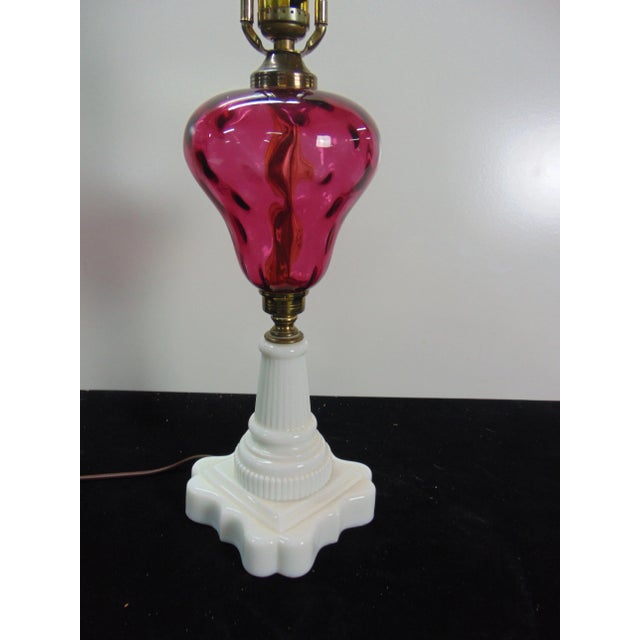 Victorian Style lamp, ruby glass pear shaped font, milk glass base.