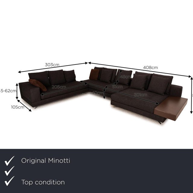 The White corner sofa from Minotti is covered in a gray fabric and stands on black metal feet. It is characterized by its...