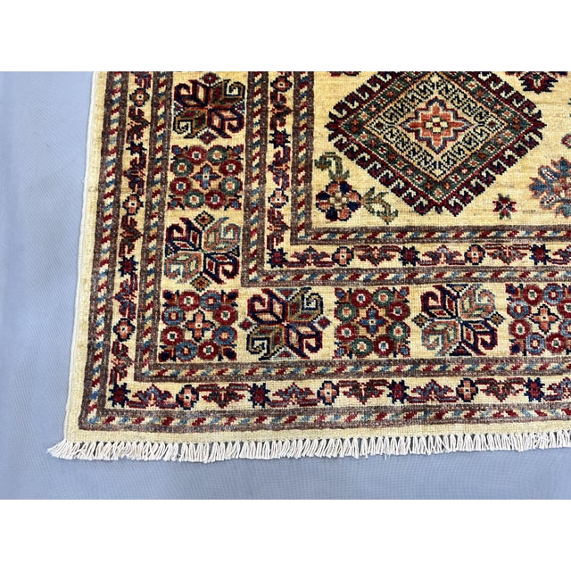 Cream Kazak Tribal Wool Rug With Medallions, 5'4" X 7'4" For Sale - Image 12 of 14