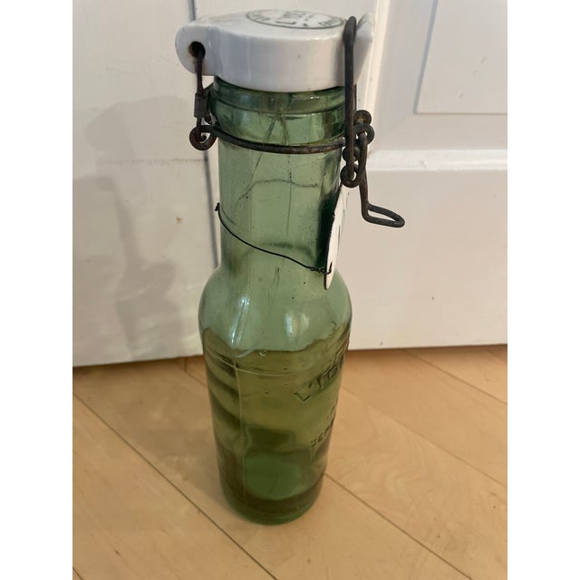 1900 - 1909 French Antique l'Ideale Bottle With Porcelain Top For Sale - Image 5 of 12