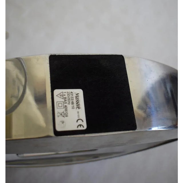 Berio from Massive Belgium, 2 silver-colored design metal design metal lamps. The lamps have a G-9 lamp holder for a...