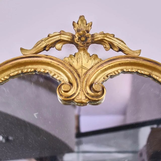 Vintage golden wood mirror moved height: 102 width: 88. This piece is attributed to the mentioned designer/maker. It has...