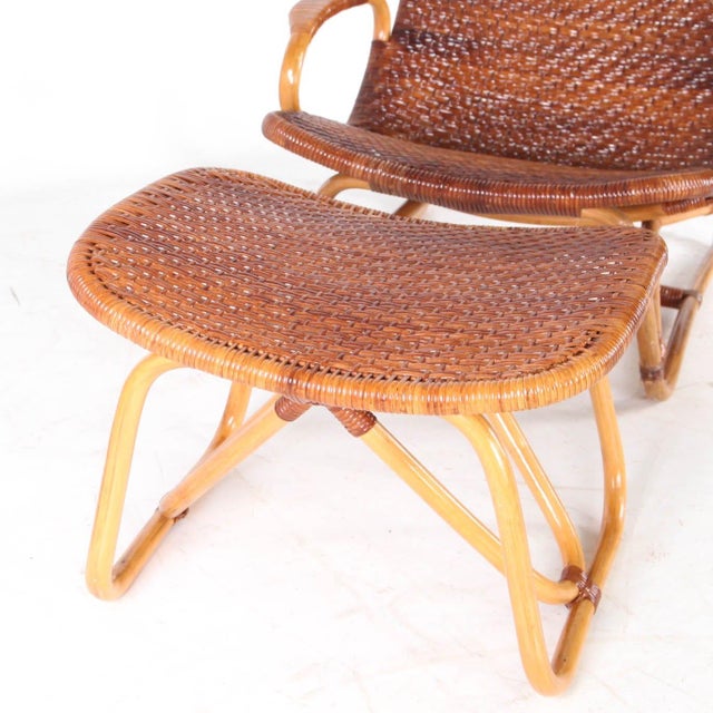 Rare vintage chaise longue and ottoman by Yuruzu Yamakawa in woven rattan. Iconic piece by the renowned Japanese designer....