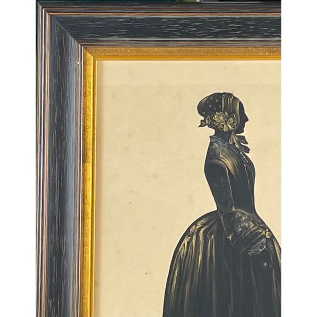 Antique full-length painted silhouette, highlighted with gilt. Mid 18th century. The gown with a V-shaped bodice and...