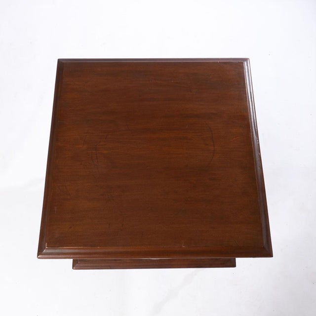 Table with spool legs and fancy apron. A lot of detailed carvings on this table. Great side table with bottom shelf.