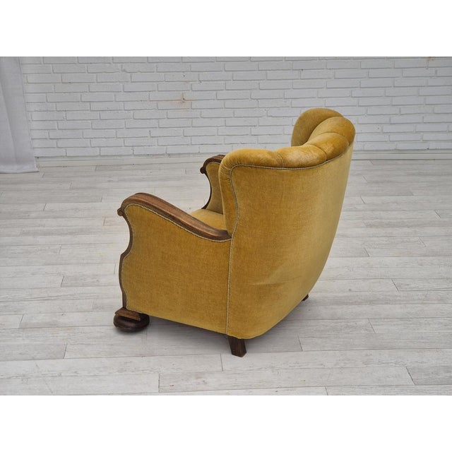 1960s, Danish relax armchair. Yellow-honning furniture velour, oak wood legs and armrests, brass springs in the seat....