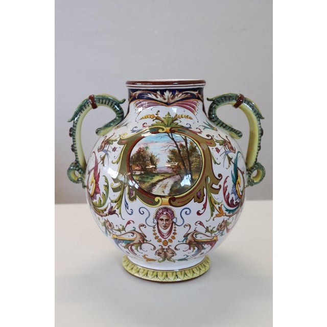 We present this stunning large vase, made in faenza, italy, dating back to the 1950s. The vase is crafted from polychrome...