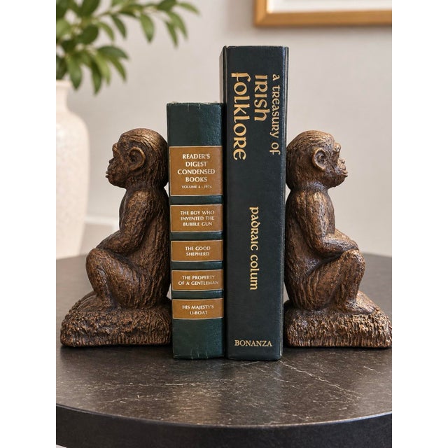 Charming pair of vintage Melannco “The Keeper of Memories” chimpanzee bookends featuring intricate sculptural details,...