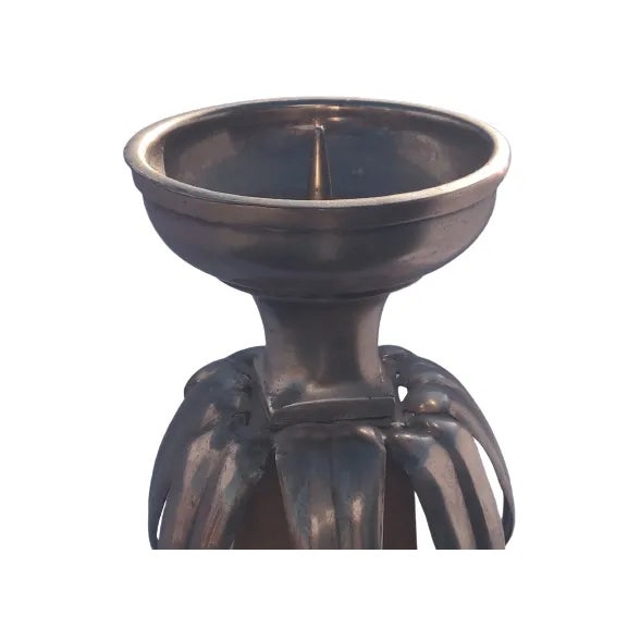 This stylish Wooden candle holder adds a touch of 1950s art deco-style glamour to your room. The sleek candle holder with...