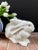 Vintage ceramic white rabbit with hand painted pink ears, eyes, and nose/whiskers. Realistic and life-size, it measures...