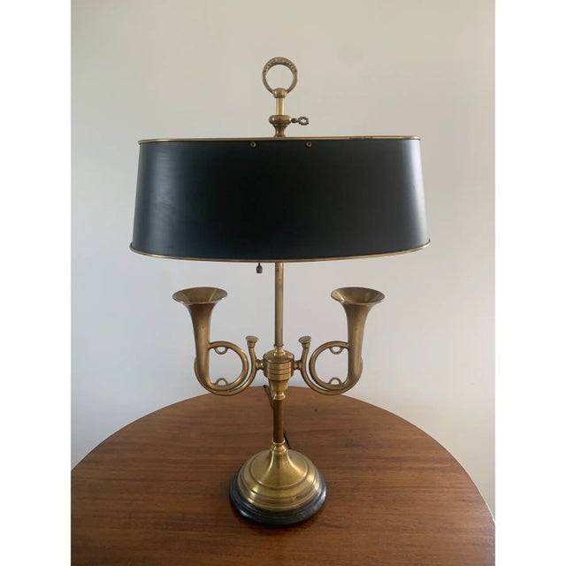 A gorgeous English Country style brass double horn bouillotte lamp with black tole shade USA, Mid-20th century Measures:...