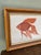 A charming hand-stitched needlepoint of a fantail goldfish rendered in warm terracotta and burnt orange tones on a cream...