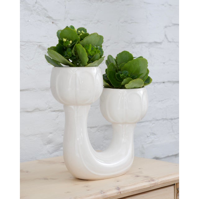 A very rare, double-headed vase or flower pot. Ceramic. Manufactured by BAY Keramik, West Germany, 1960s. Glazed on the...