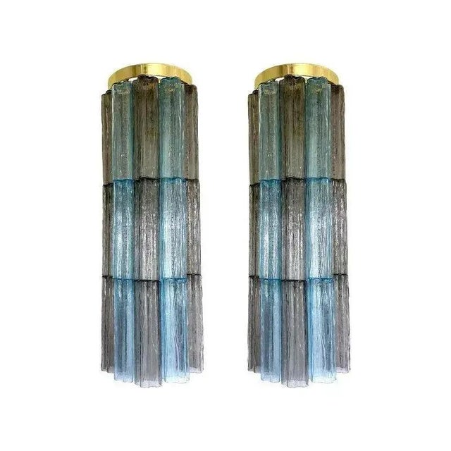 Contemporary and impressive multicolor “tronchi” wall sconces. a pair of luxury and scenographic wall sconces made in...