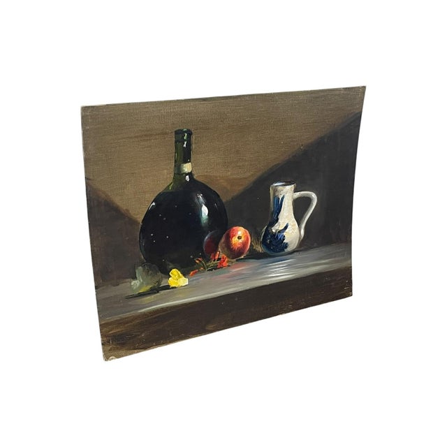 Vintage still life painting depicting a tabletop arrangement of a dark glass bottle, a white ceramic pitcher with blue...