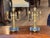 Pair of mid 19th C. French gilt bronze and marble two light candelabra, each with a fluted column hung with a husk swag...