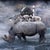 This photograph presents a surreal scene where a rhinoceros serves as a vessel for a variety of animals, all gathered atop...