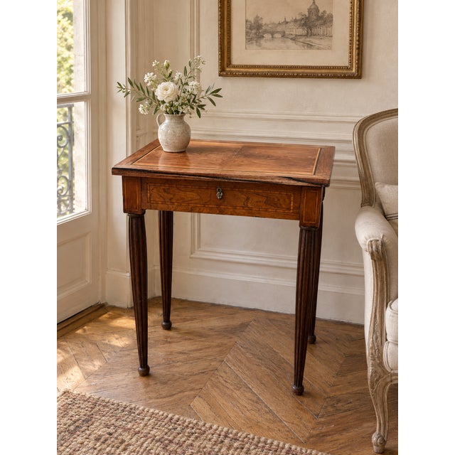 Elegant french marquetry side table with a concealed mirror and storage compartment, dating from the second half of the...