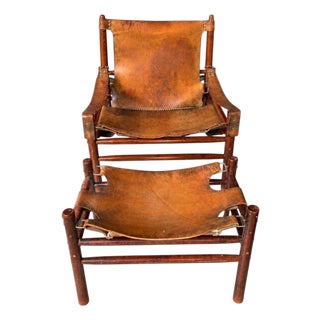 Set of Leather Safari Lounge Chair and Ottoman in the style of Arne Norell, 1970s For Sale