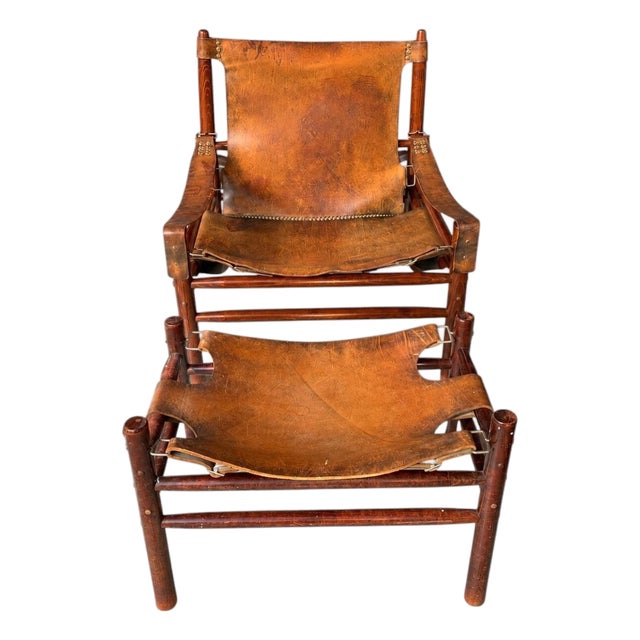 Set of Leather Safari Lounge Chair and Ottoman in the style of Arne Norell, 1970s For Sale