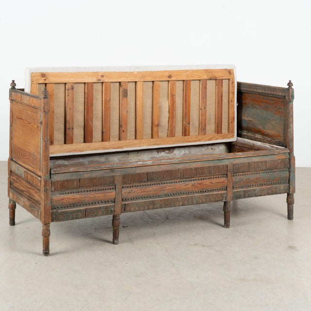 19th century Swedish Gustavian bench, crafted in pine with a heavily distressed original teal blue painted surface....