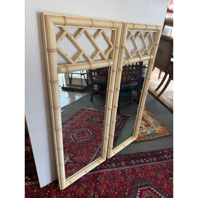 Design Plus Gallery presents a Pair of Ivory Chinoiserie Wall Mirrors by Dixie Aloha. This pair of mirrors are...