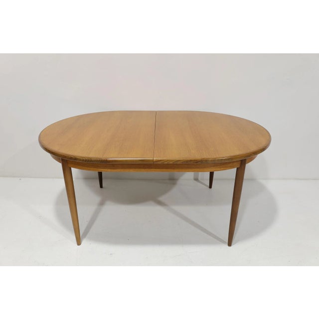 A good Mid-Century Modern G Plan teak extendable dining table from the "Fresco range", designed by V.B. Wilkins, 1960s....
