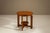 A compact composition with a strong architectural rhythm, this Amsterdam School side table balances solid oak with a...