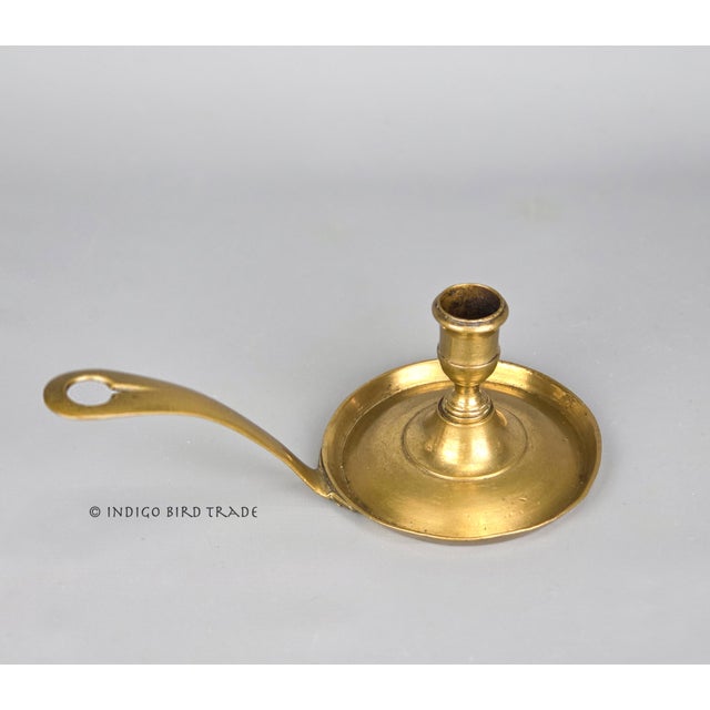 Antique French Bronze Candlestick Holder with Long Handle This beautiful candle holder is made of bronze and features a...