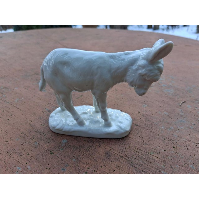 Small donkey from the Nymhenburg porcelain manufactory, mark 1976-1997, design Mene/Göhring around 1926. This piece has an...