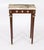 This is an elegant petite French Louis Revival console table dating from the 1950's. This magnificent piece is crafted...
