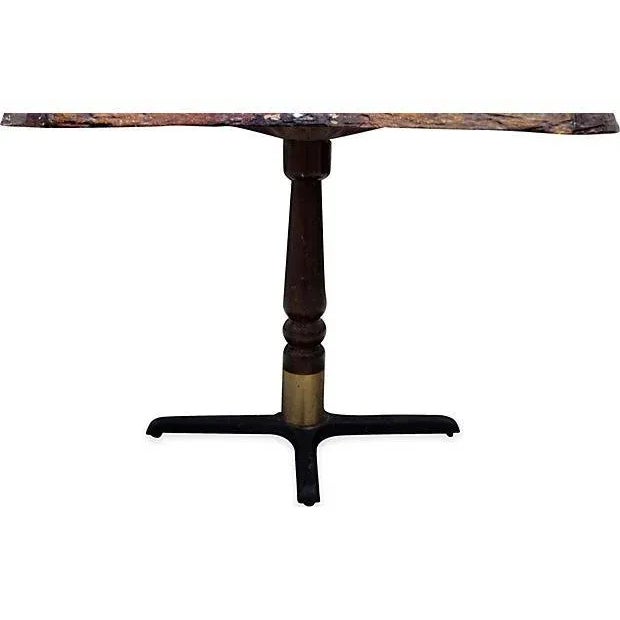 Dining table with stunning rustic wood 2" thick covered with resin and metal feet. Incredible top details with gold-tone...