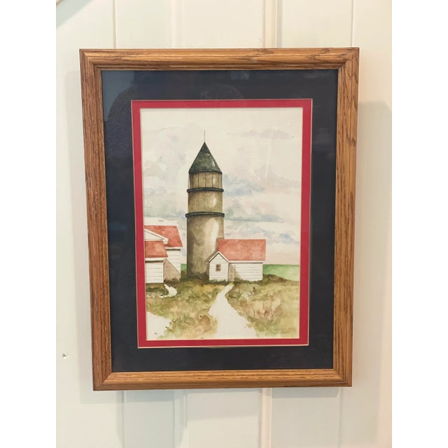 Beautiful original signed painting summer scene of a lighthouse. This watercolor painting is framed and matted. Signed...