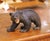 This expressive hand-carved walnut bear sculpture was crafted in Japan circa 1970. Sculpted from solid walnut, the figure...