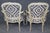 Add a touch of refined elegance to your home with this stunning pair of French Louis XV style armchairs, beautifully...