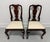 A pair of Queen Anne style dining side chairs by Henkel Harris of Winchester, Virginia, USA. Solid mahogany, carved crest...