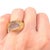 Boucheron 18k rose gold ring from the Jaipur collection, featuring a smooth cabochon-cut rose quartz. The oval stone,...