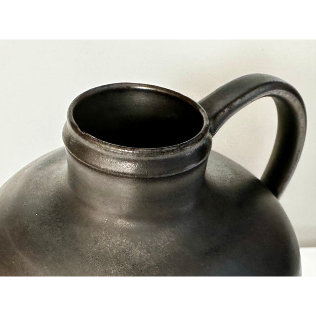 This high-quality studio ceramic vase was crafted by the German ceramicist Josef Höhler (1909-1964) in Friedrichsroda,...