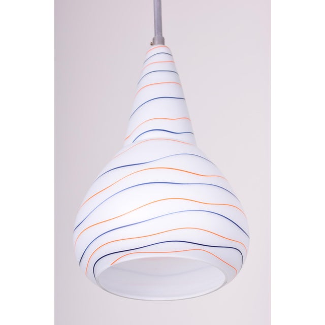 This stylish pendant chandelier dates back to the 1960s and is a prime example of Czechoslovak design that harmoniously...