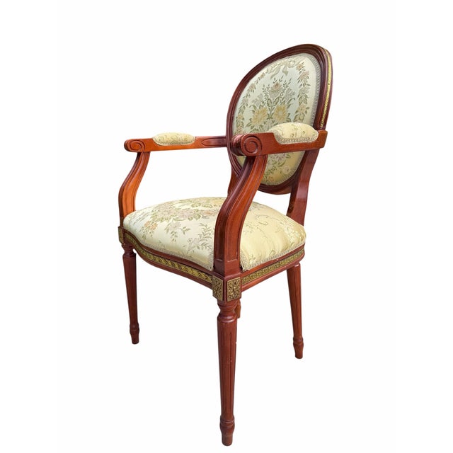 Elegant Spanish-made neoclassical accent armchair by Fejomi, crafted in mahogany with finely detailed gilt metal ormolu-...